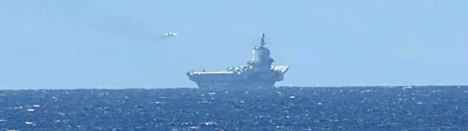 A PLAN Shenyang J-15 carrier-based fighter aircraft is preparing to land on Chinese aircraft carrier PLANS Shandong (CV-17) 20240719.jpg